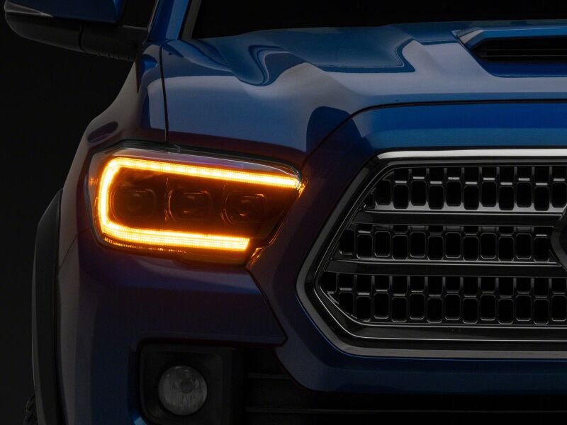 Raxiom 16-23 Toyota Tacoma CXR Series V2 LED Projector Headlights- Black Housing- Clear Lens